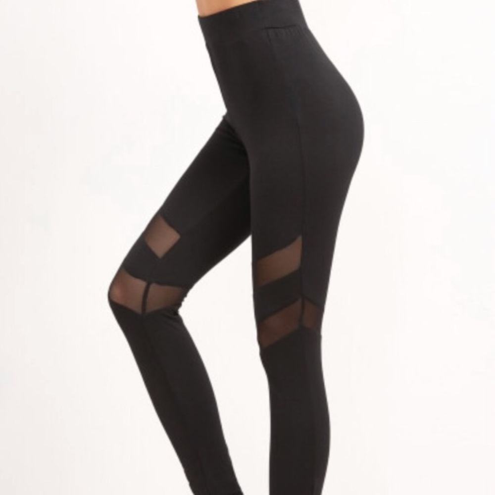 Mesh, cut out leggings. Tags off but brand new!